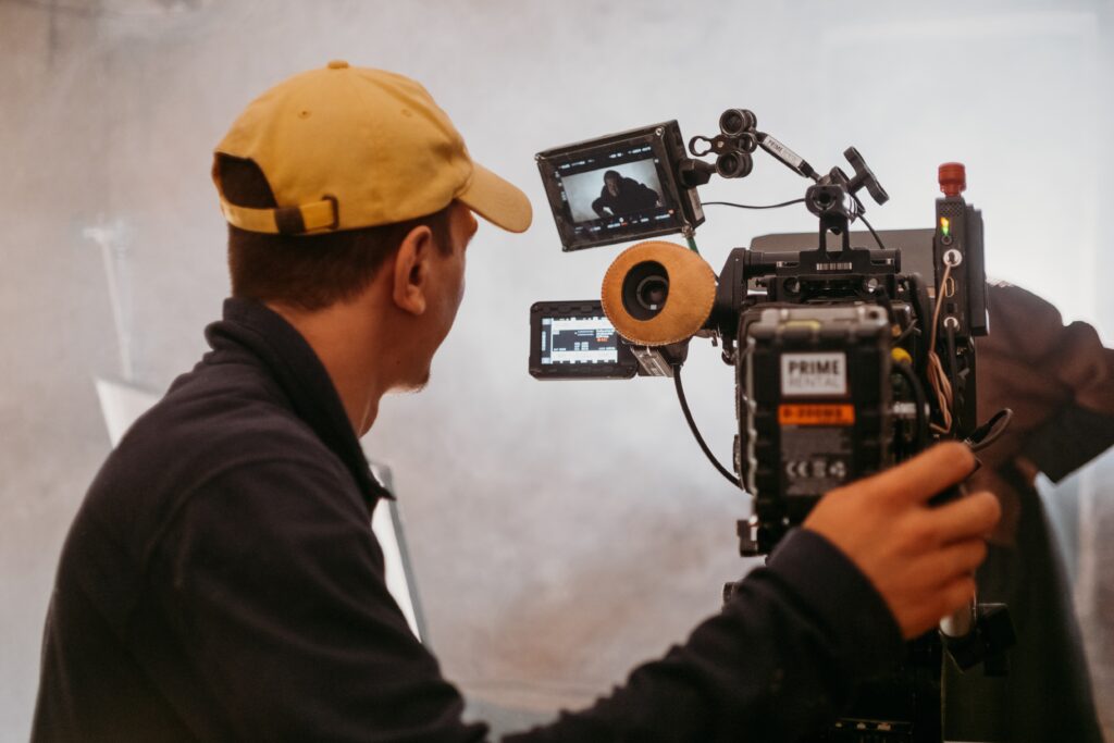 Cameraman checking the monitor on a cinema camera rig